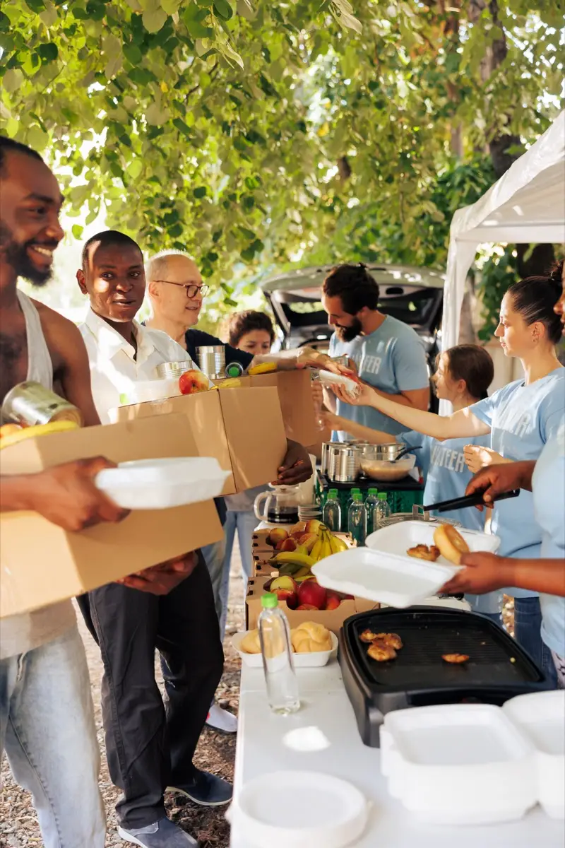charity workers giving out food and donations